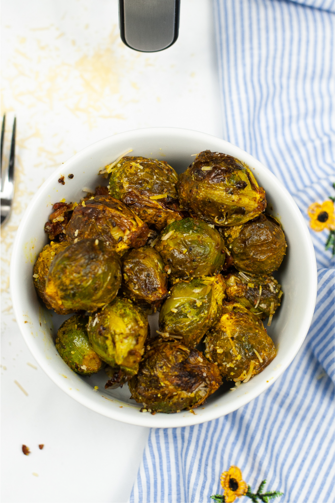White serving bowl with air fryer brussel sprouts