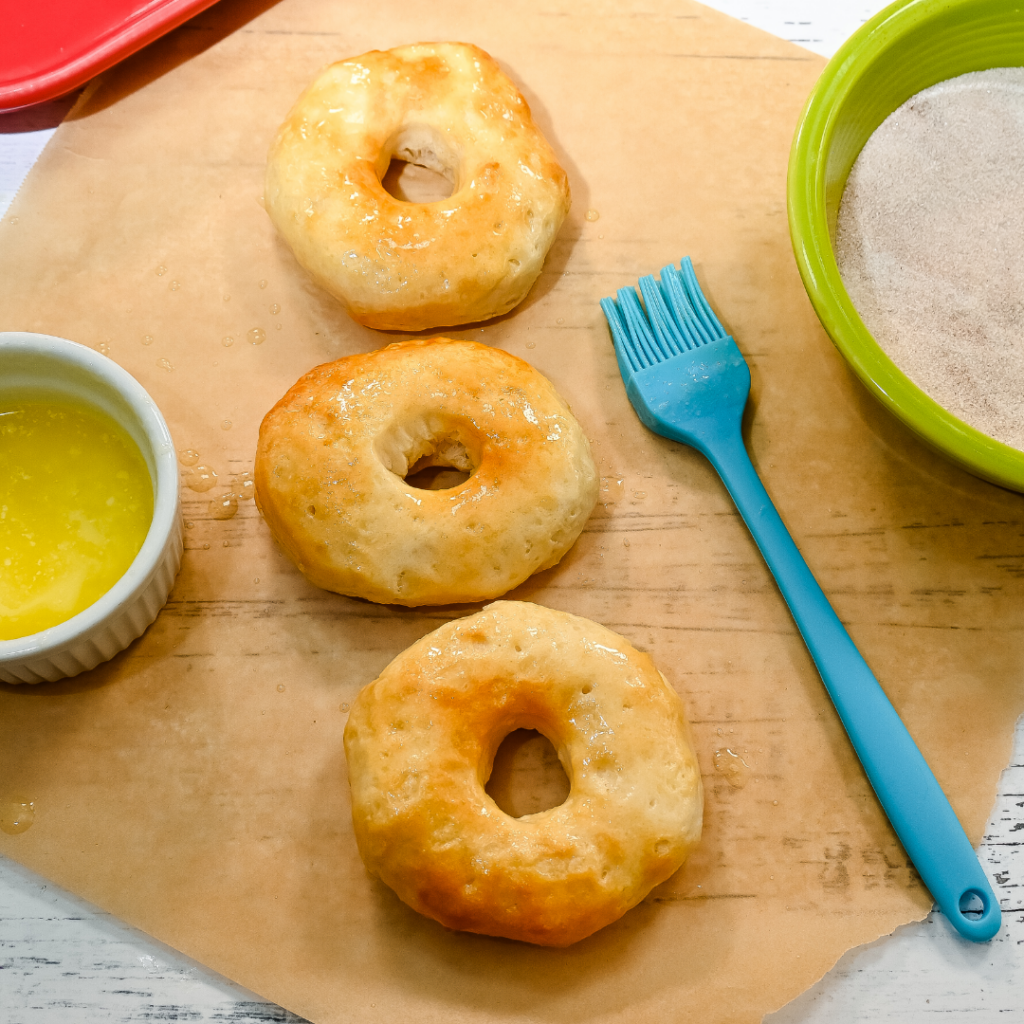 The freshly cooked Easiest Donuts in the Air Fryer from Biscuits