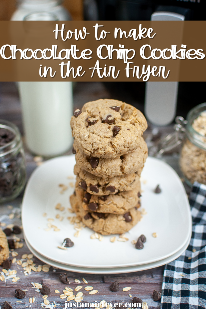 Title image with a stack of chocolate chip cookies from the air fryer on a white plate with oats and chocolate chips around and a black checked napkin