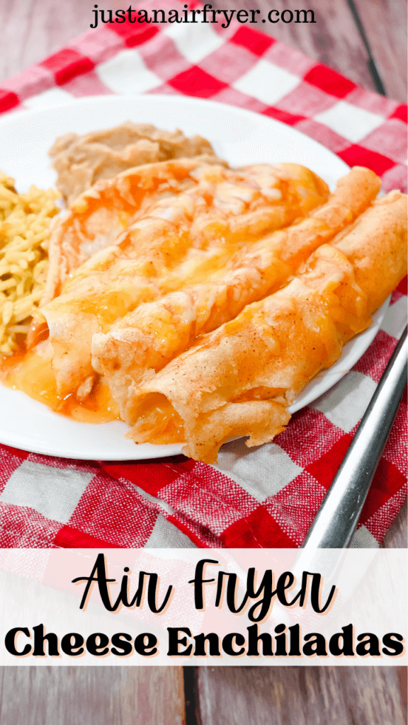 Title image for Air Fryer Cheese Enchiladas with a close up of the enchiladas on a white plate on a red checked towel along with rice and beans on the plate. 