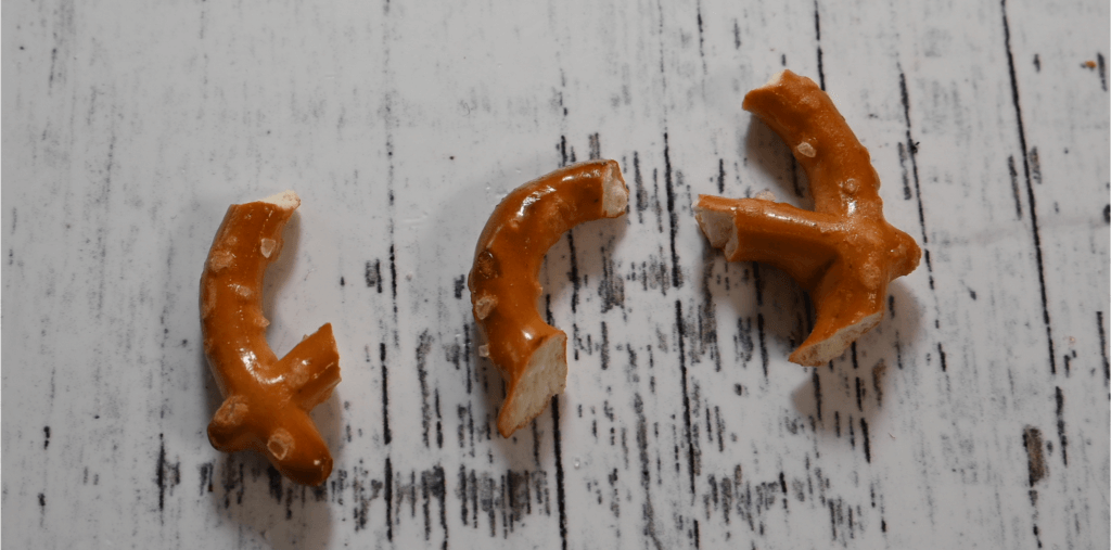 Broken pretzel pieces to make pumpkin stems